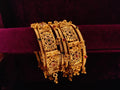 Traditional Gold-Tone Designer Bangles Set with Kundan-Style Floral & Stone Work